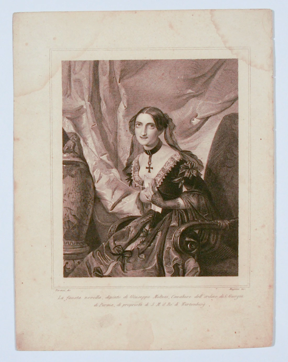 Figura femminile seduta